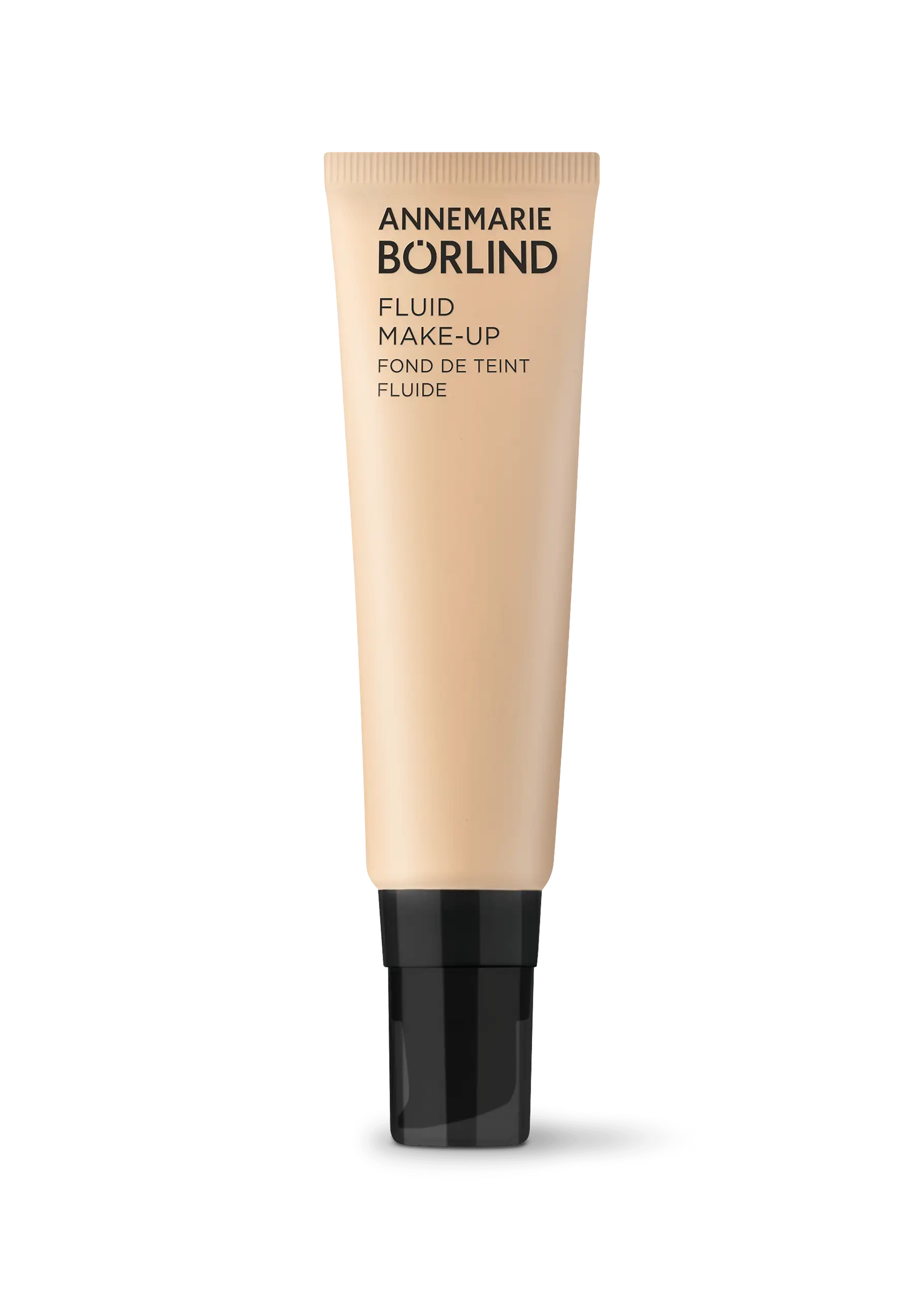 ANNEMARIE BÖRLIND Fluid Make-up in beige mit schwarzem Pumpspender, 30 ml Tube vor schwarzem Hintergrund