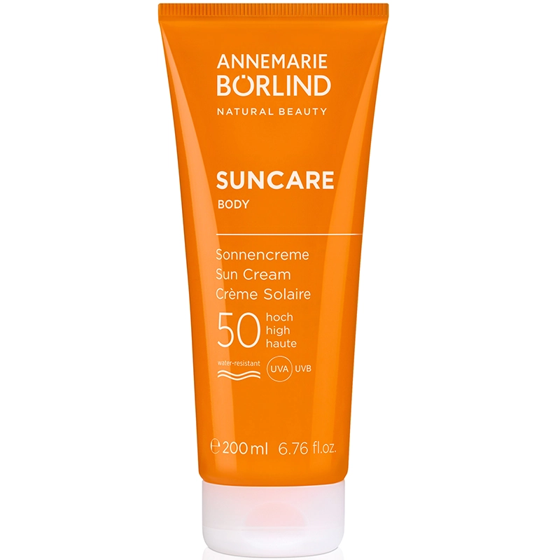Sonnenschutzmittel ANNEMARIE BÖRLIND SUNCARE Sonnencreme für den Körper mit LSF 50 in orangefarbener Tube, wasserfest.