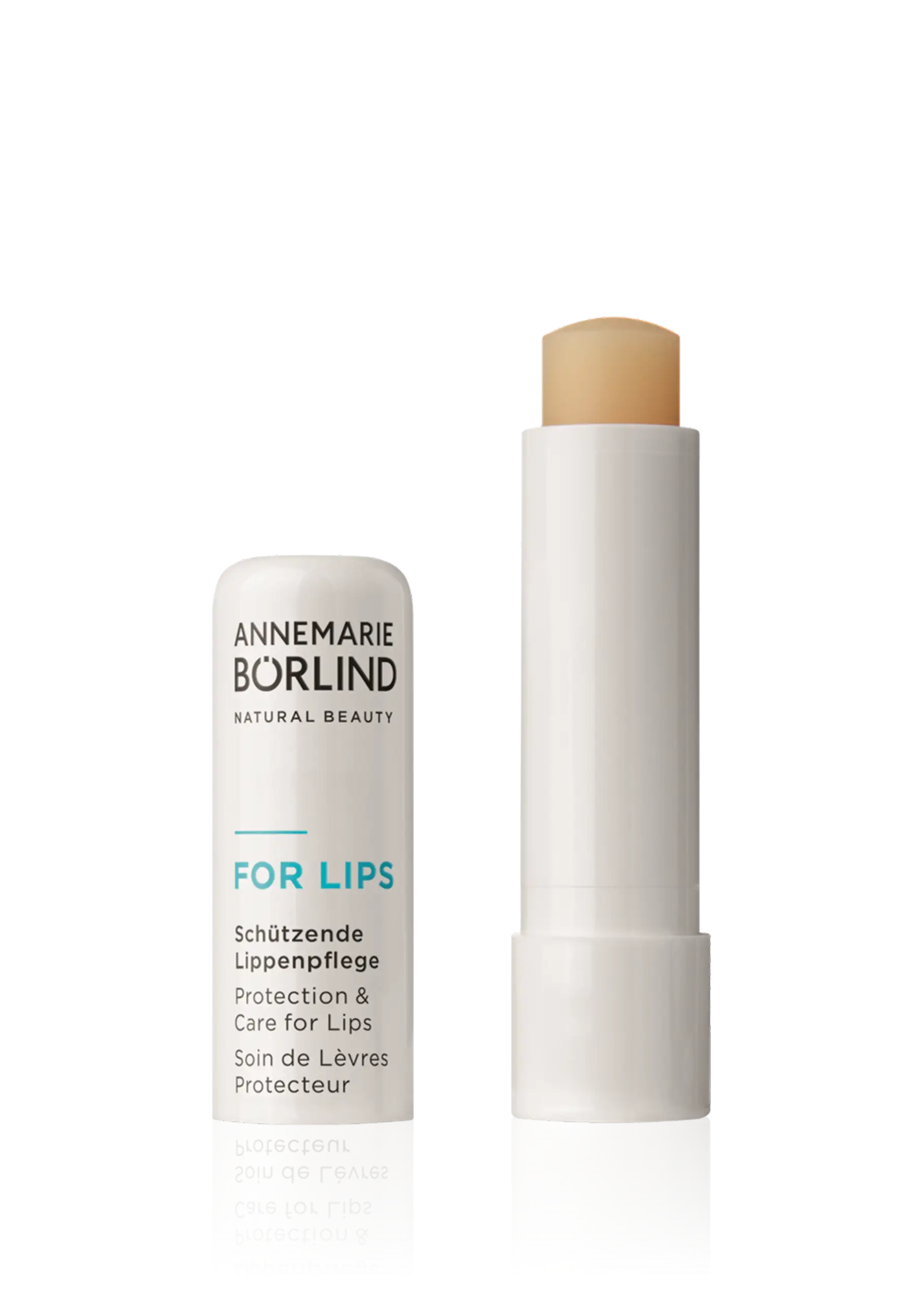 ANNEMARIE BÖRLIND FOR LIPS schützende Lippenpflege im geöffneten weißen Stift mit Text
