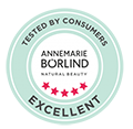 Testsiegel mit fünf roten Sternen und Schriftzug "ANNEMARIE BÖRLIND Natural Beauty Tested by Consumers Excellent