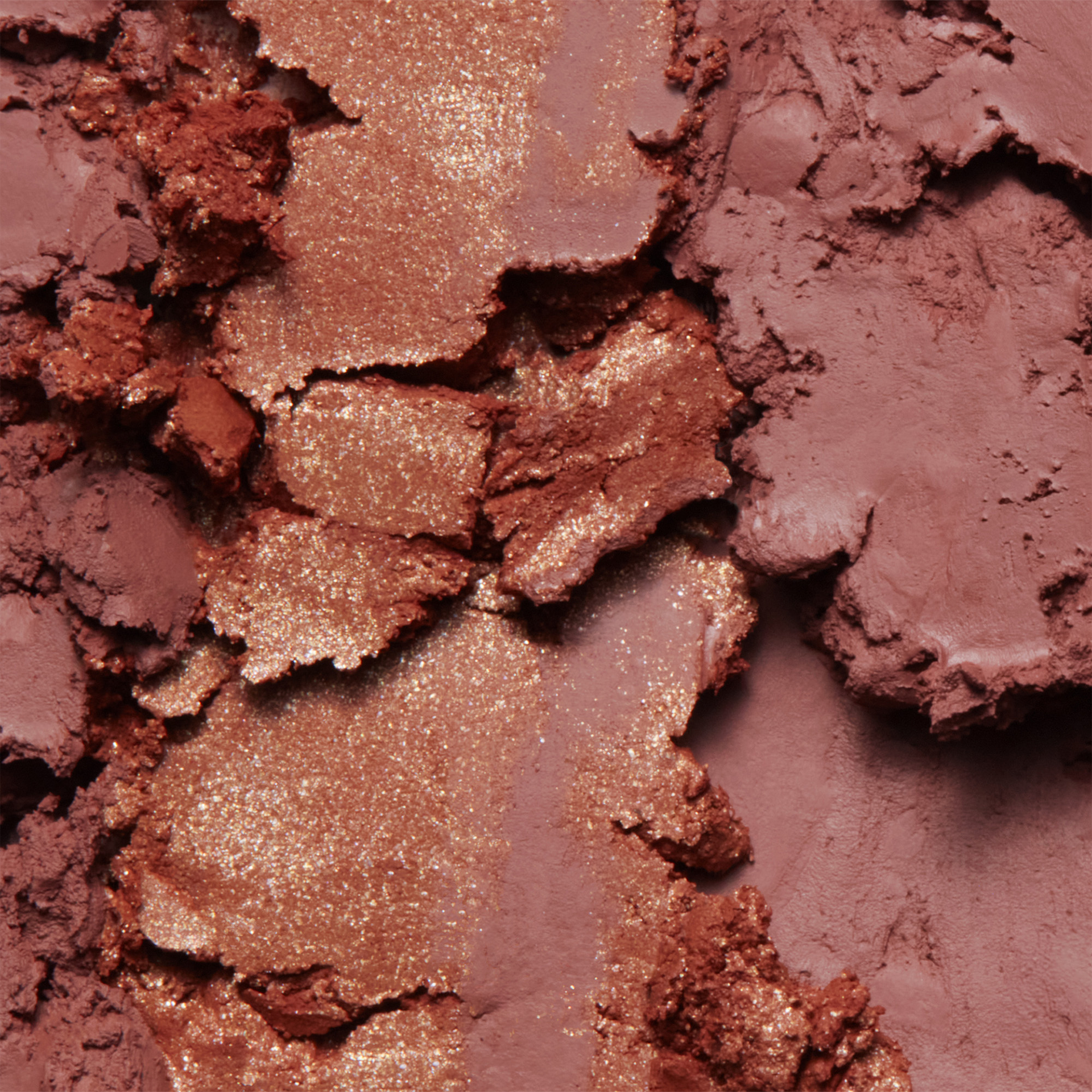 ANNEMARIE BÖRLIND Make-up-Puder in matten und schimmernden Rosé- und Kupfertönen, Nahaufnahme