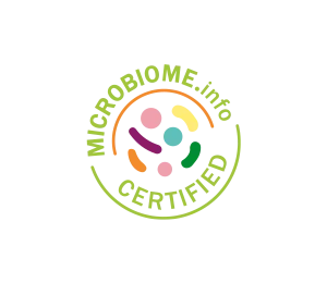 Gütesiegel „Microbiome-friendly“ Mikrobiom-freundlich zertifiziertes Siegel mit grünem Schriftzug und buntem stilisiertem Mikrobiom-Symbol in der Mitte