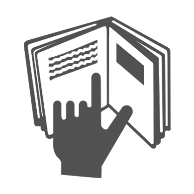 Hand mit ausgestrecktem Zeigefinger zeigt auf eine geöffnete Buchseite mit Text und Linienzeichnung