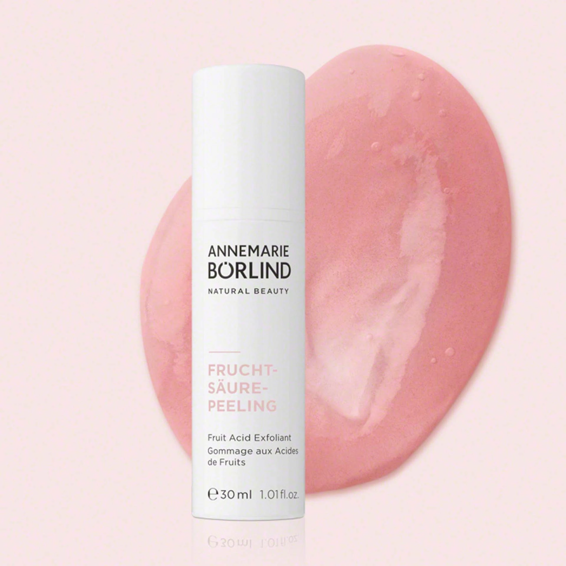ANNEMARIE BÖRLIND Fruchtsäure-Peeling 30 ml vor rosa, gelartiger Textur auf hellem Hintergrund