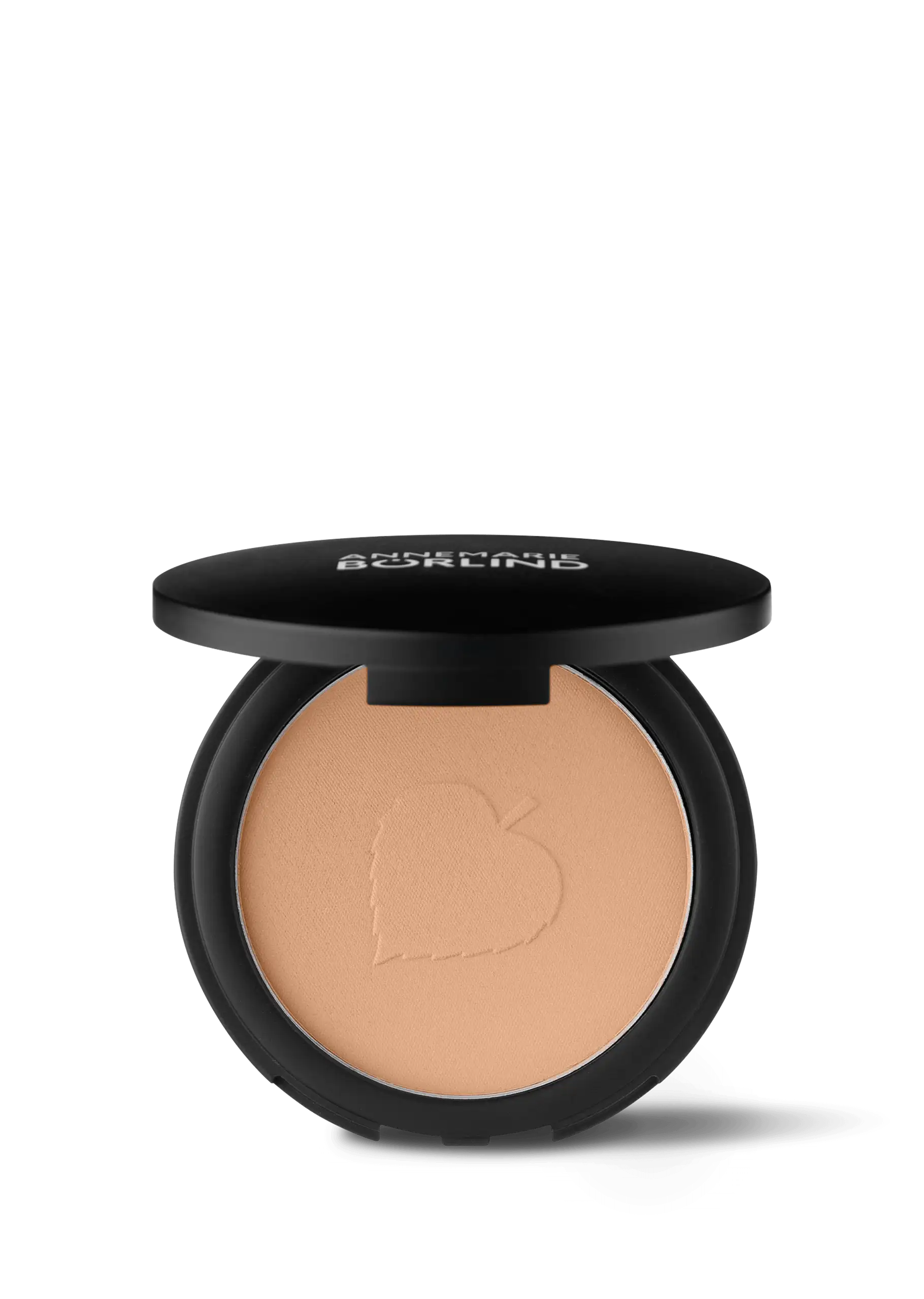 ANNEMARIE BÖRLIND Compact Powder Teint in Mandel, schwarze Dose mit offenem Deckel und Prägung im Puder