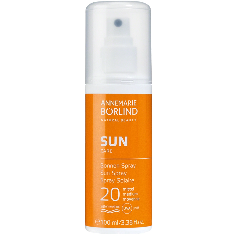 ANNEMARIE BÖRLIND SUNCARE Sonnen-Spray mit LSF 20 in orange-weißer Sprühflasche, wasserfest.