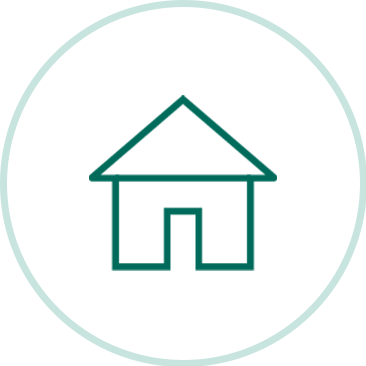 Symbol eines Hauses mit Tür, grün gezeichnet in einem hellgrünen Kreis auf weißem Hintergrund