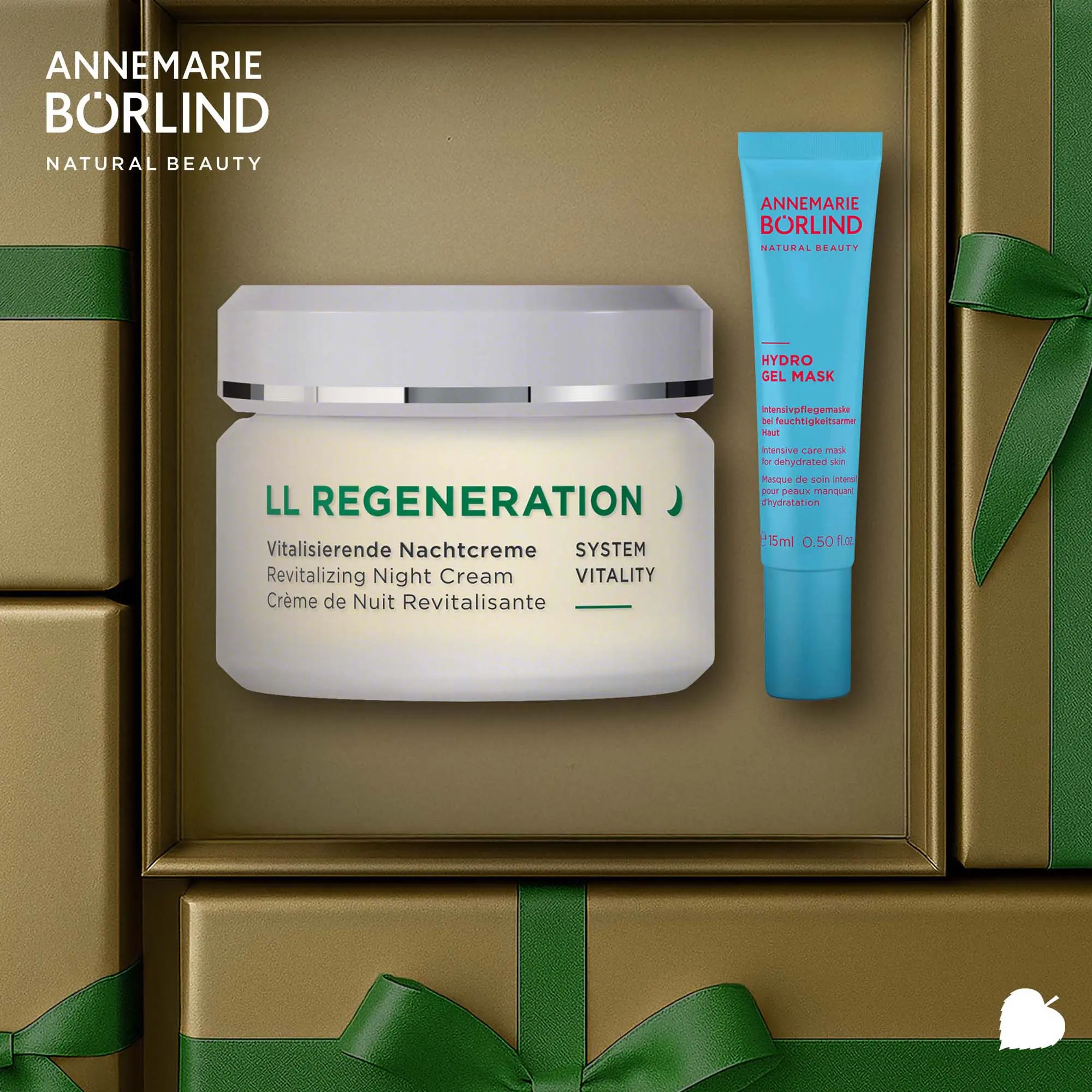 ANNEMARIE BÖRLIND Winter Recovery Night Set mit Nachtcreme und Hydro Gel Mask in goldener, festlicher Verpackung liegend