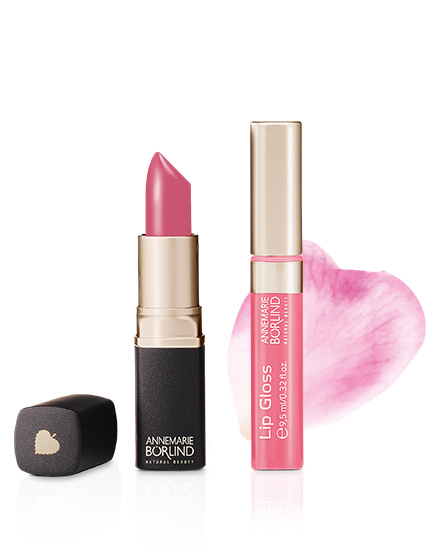 ANNEMARIE BÖRLIND Lippenstift und Lip Gloss in Rosé mit gold-schwarzer Verpackung und Lippenabdruck